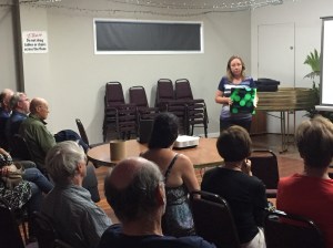Teresa Angell showing her  photo book.